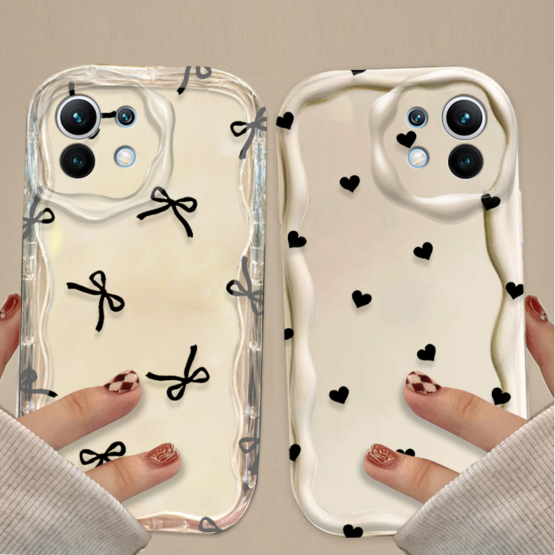 جراب أسود بتصميم فيونكة وقلب ل - مراجعة Xiaomi Poco X6 وسعره