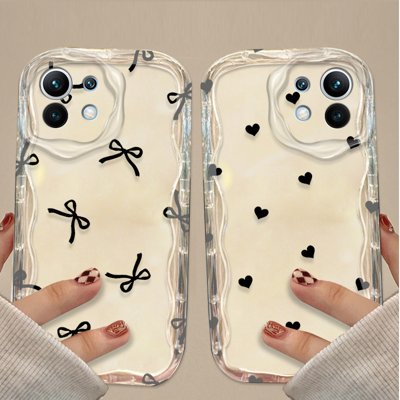 جراب أسود بتصميم فيونكة وقلب ل - مراجعة Xiaomi Poco X6 وسعره