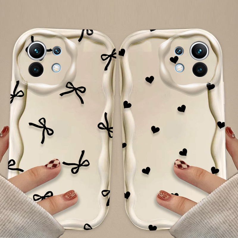 جراب أسود بتصميم فيونكة وقلب ل - مراجعة Xiaomi Poco X6 وسعره